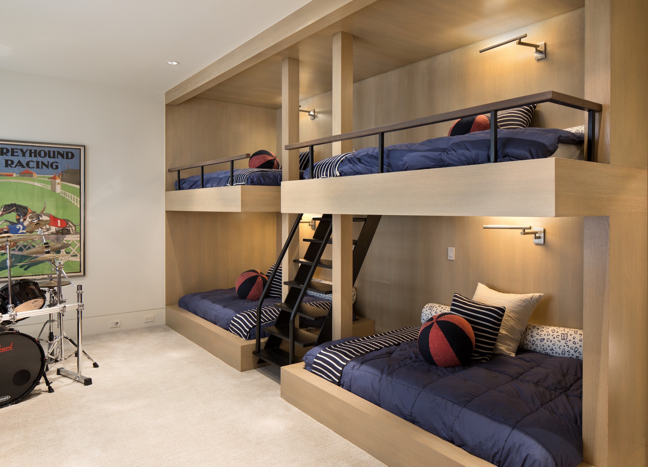 Childrens bunk beds with a drum set up.